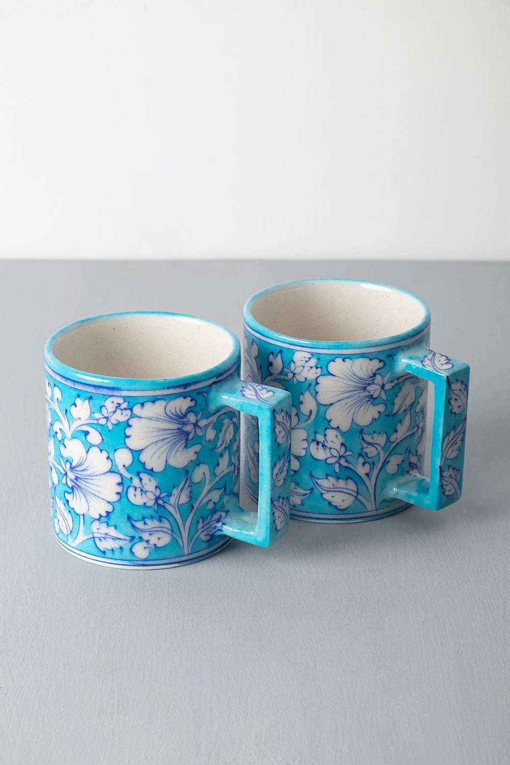 Pair of Turquoise Jasmine Mugs — handmade Jaipur blue pottery from the Mugs & Cups collection