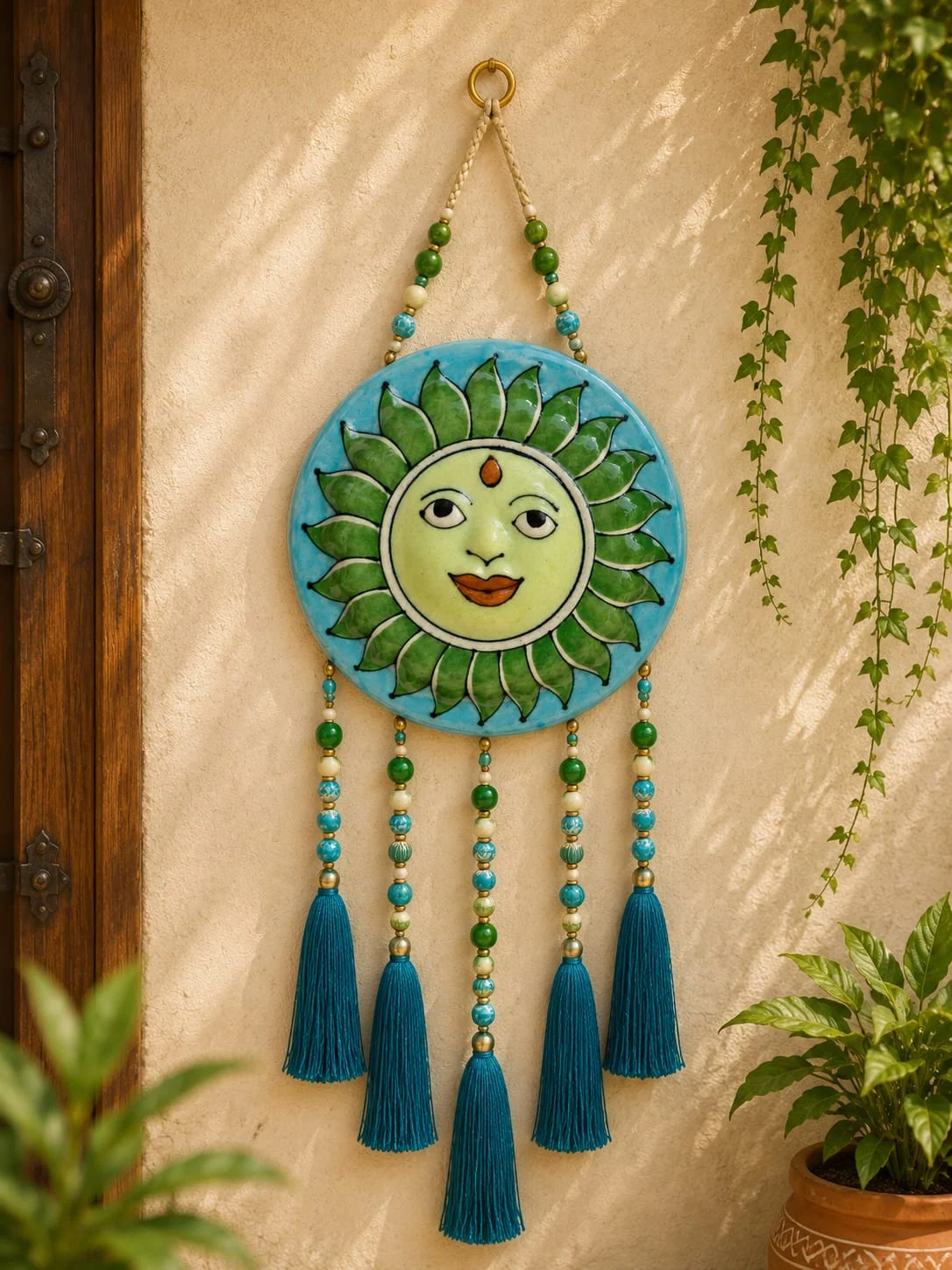 Turquoise Sun Wall Hanging — handmade Jaipur blue pottery from the Home Decor collection