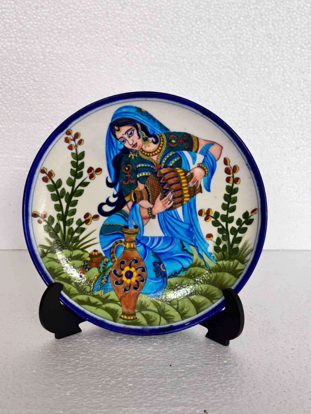 Indigo Flute Player Plate — handmade Jaipur blue pottery from the Plates & Wall Art collection