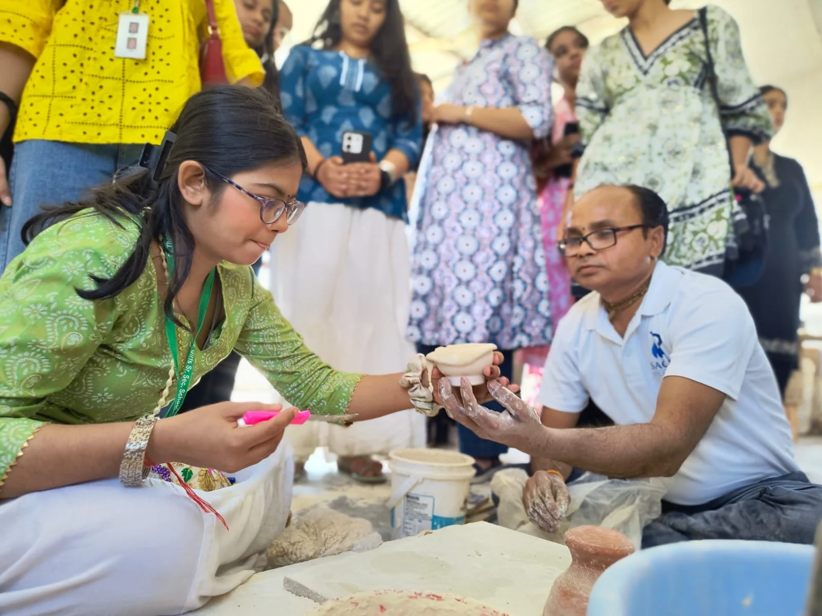 Colouring — blue pottery craft stage in the Sagar Blue Art Pottery workshop