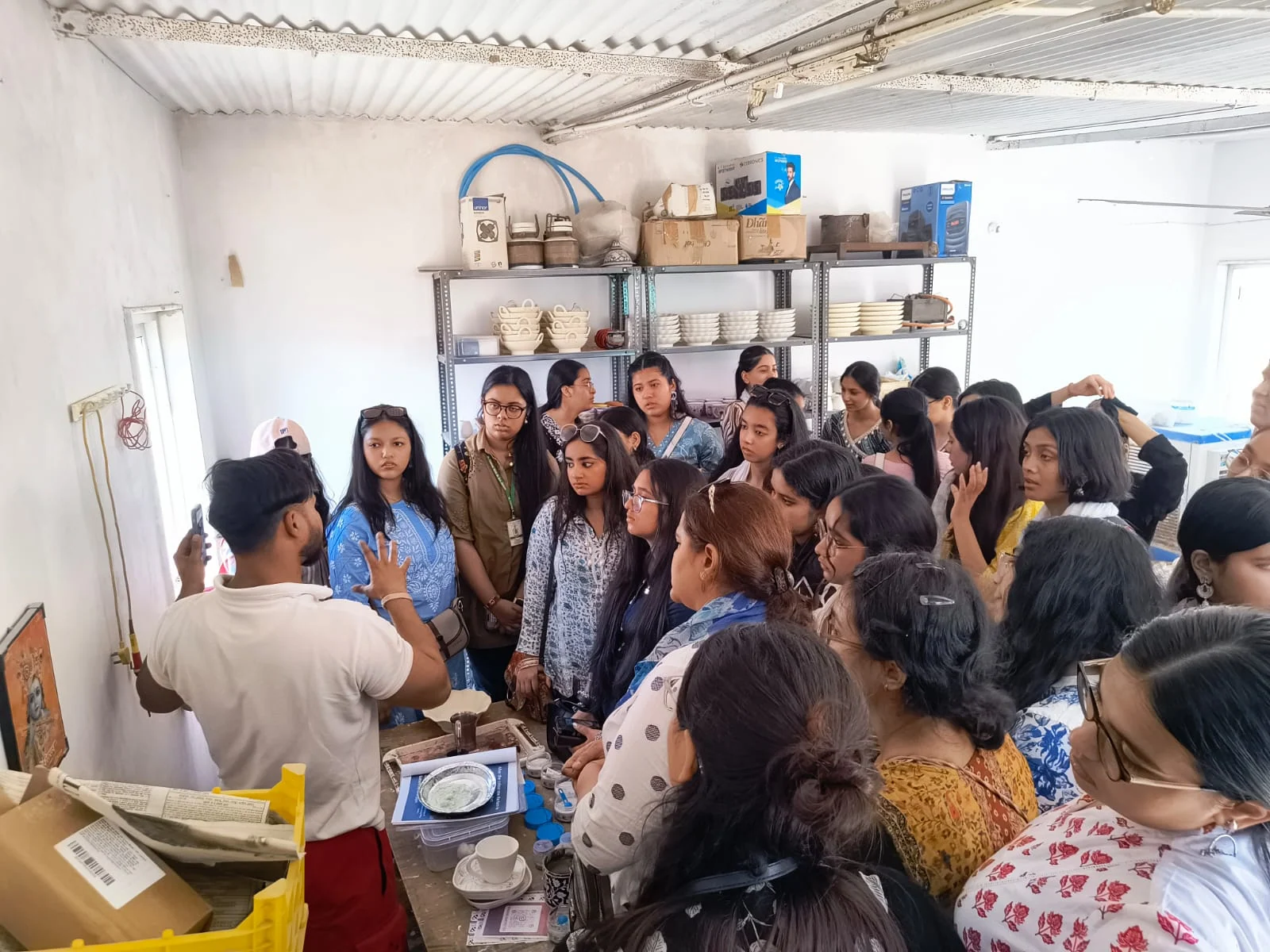 Finishing — blue pottery craft stage in the Sagar Blue Art Pottery workshop